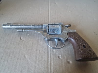 - Castalla Metal Cap Gun Cowboy Toy.