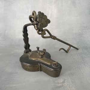 Miner's oil lamp marked "1834"