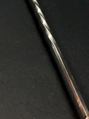 Longue cuillère à cocktail en métal argenté à décor torsadé