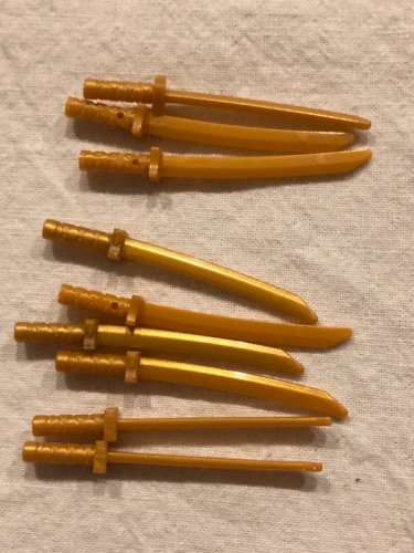 Lot d épées Lego argentées/dorées/colorées