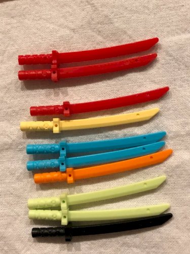 Lot d épées Lego argentées/dorées/colorées