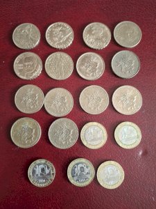 Set of 19 different 10 franc coins from 1974 to 1992, including commemorative coins.