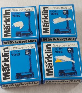Set of 4 vintage signal controls, Märklin, 7045, in HO scale.