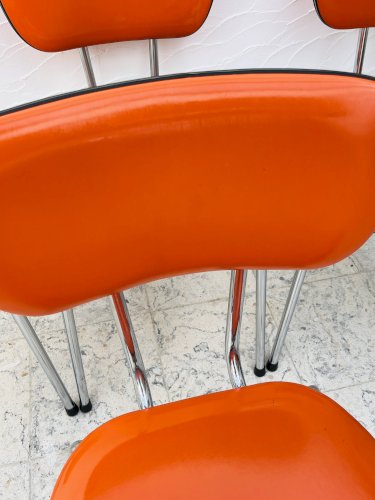 Lot de 4 chaises en skaï orange