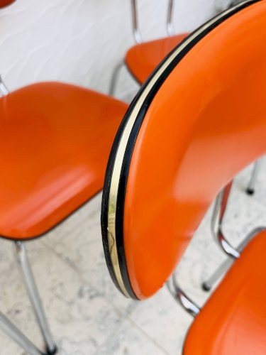 Lot de 4 chaises en skaï orange