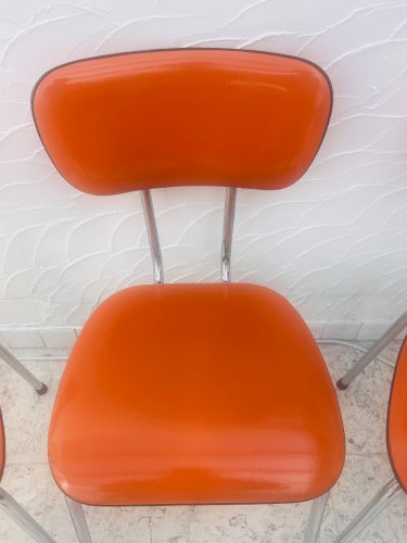 Lot de 4 chaises en skaï orange