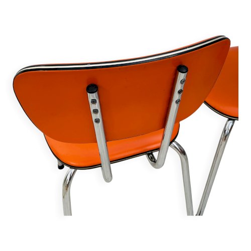Lot de 4 chaises en skaï orange