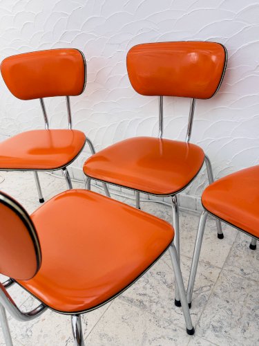 Lot de 4 chaises en skaï orange