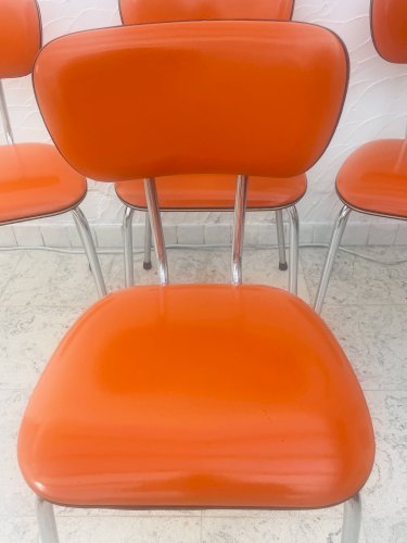 Lot de 4 chaises en skaï orange