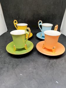 set of 4 espresso cups and saucers signed Genevieve Lethu in good condition