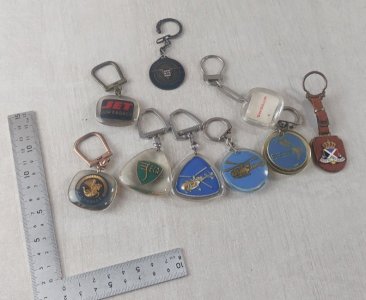 Set of 9 vintage advertising keychains, Bourbon.