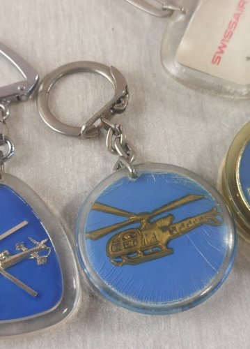 Lot de 9 anciens portes clés publicitaires, Bourbon, vintage