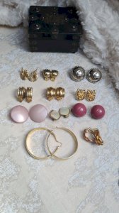 lot of vintage earrings and clips
