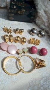 lot of vintage earrings and clips