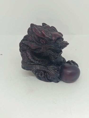 lot de deux sculptures asiatiques forme dragon et tigre en bon etat