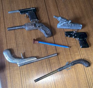 Lot of toys old eureka magenta skip gun and rare 19th century gun