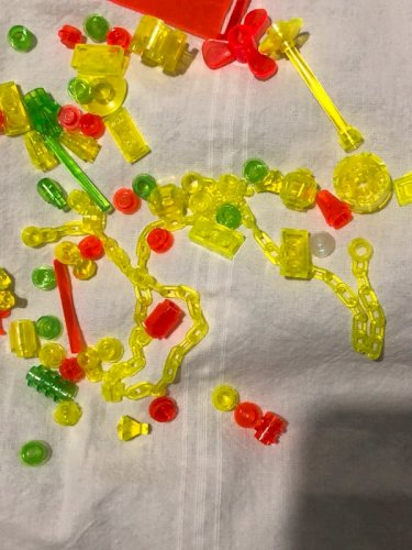 Lot de pièces de finition Lego fluorescentes jaunes oranges et vertes