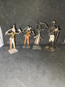 lot of four handcrafted painted metal sculptures from Africa in good condition