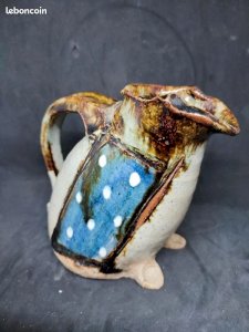 Beautiful stoneware pitcher signed by Lionel Postal in the shape of a frog in good condition.