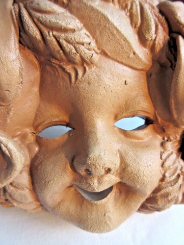Masque mural, sculpture en terre cuite, Enfant aux feuilles et épis de blé