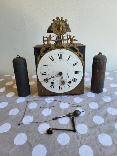 MECANISME D'HORLOGE COMTOISE AU SOLEIL