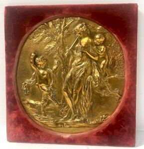 Médaillon rond a décor a l'antique en bronze doré XIX siècle