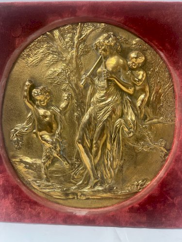Médaillon rond a décor a l'antique en bronze doré XIX siècle