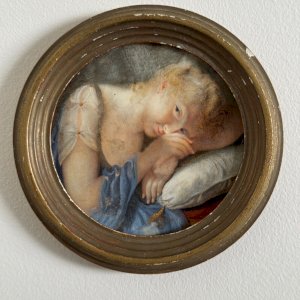 19th century miniature of a young girl resting her head on a cushion A5627