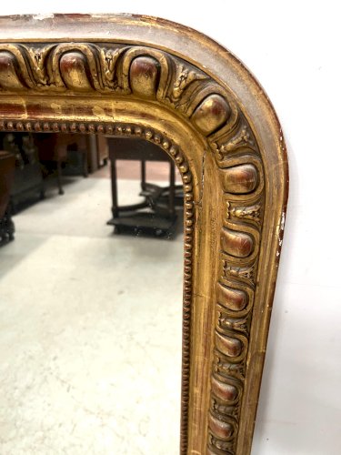 Miroir a godrons Louis Philippe en bois et stuc doré XIX siècle