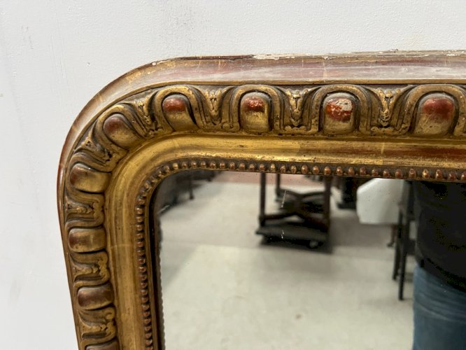 Miroir a godrons Louis Philippe en bois et stuc doré XIX siècle