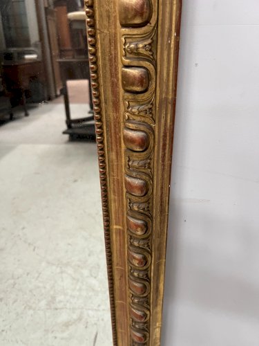 Miroir a godrons Louis Philippe en bois et stuc doré XIX siècle