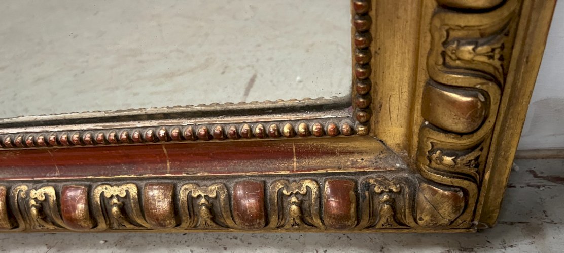 Miroir a godrons Louis Philippe en bois et stuc doré XIX siècle