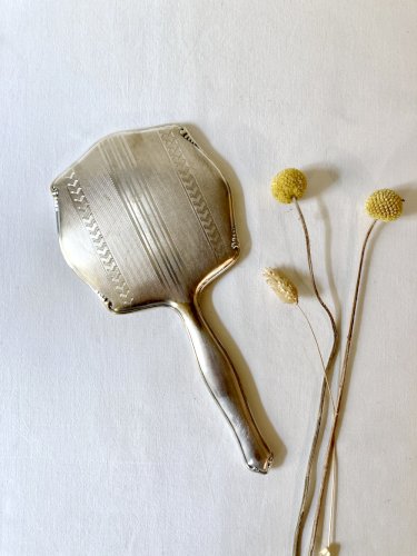 Miroir à main Art Déco en métal argenté et verre biseauté – Circa 1930