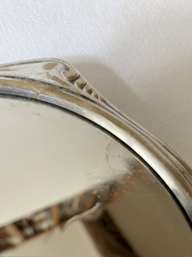 Miroir à main Art Déco en métal argenté et verre biseauté – Circa 1930