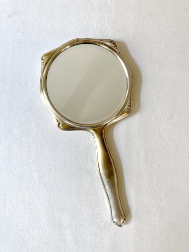 Miroir à main Art Déco en métal argenté et verre biseauté – Circa 1930