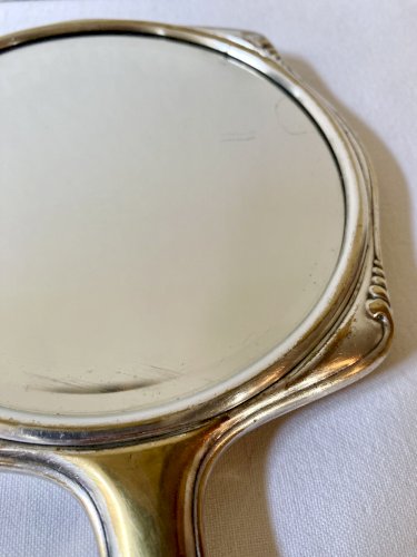 Miroir à main Art Déco en métal argenté et verre biseauté – Circa 1930