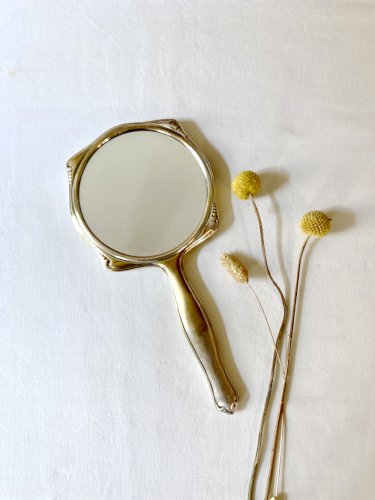Miroir à main Art Déco en métal argenté et verre biseauté – Circa 1930