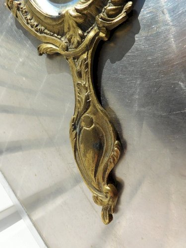MIROIR A MAIN EN BRONZE AVEC GLACE BIZEAUTEE