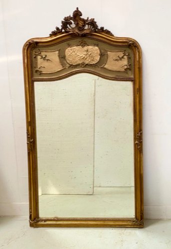 Miroir de style Louis XV en bois et stuc doré XX siècle