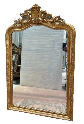 Miroir de style Louis XV en bois et stuc doré XX siècle
