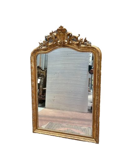 Miroir de style Louis XV en bois et stuc doré XX siècle