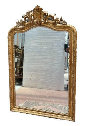 Miroir de style Louis XV en bois et stuc doré XX siècle