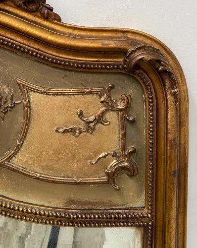 Miroir de style Louis XV en bois et stuc doré XX siècle