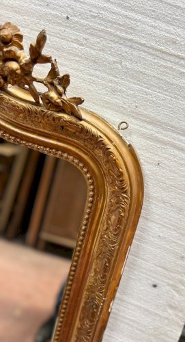Miroir de style Louis XV en bois et stuc doré XX siècle