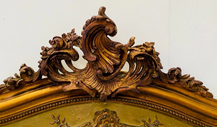 Miroir de style Louis XV en bois et stuc doré XX siècle