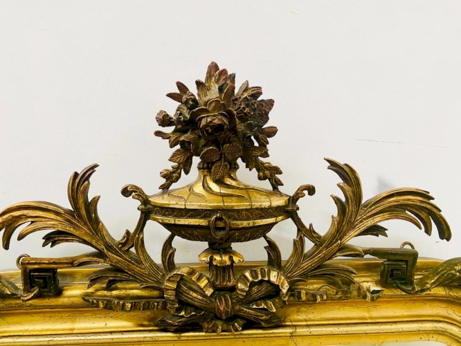 Miroir de style Louis XVI en bois et stuc doré XIX siècle