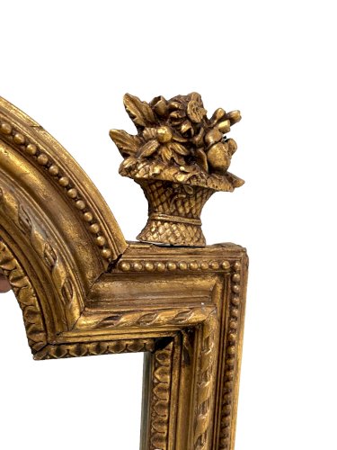 Miroir de style Louis XVI en bois et stuc doré XIX siècle