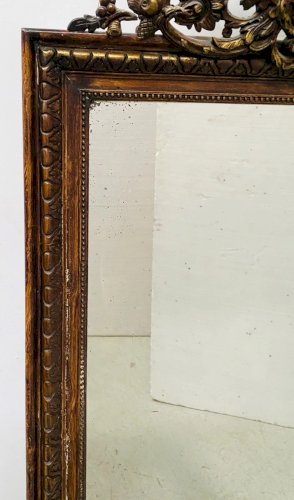 Miroir de style Napoléon III en bois et stuc patiné XX siècle