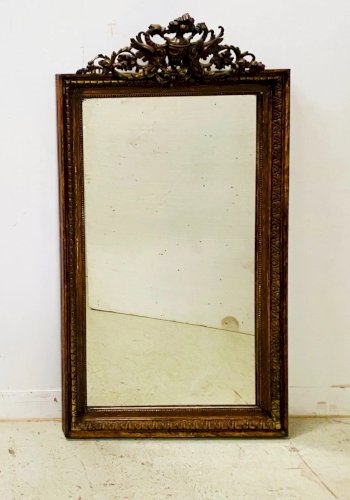 Miroir de style Napoléon III en bois et stuc patiné XX siècle