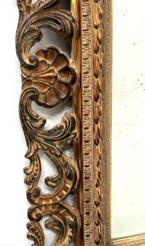 Miroir de style Napoléon III en bois sculpté XX siècle